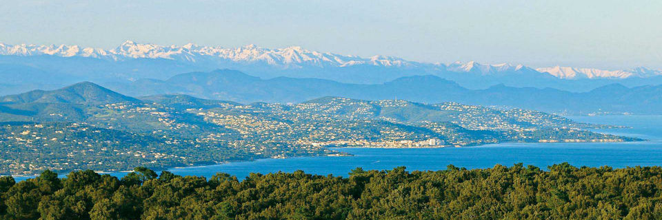 saint maxime with snow capped mountains