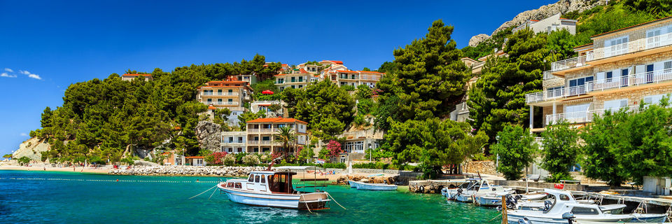 Villas over looking Brela marina with boats, Dalmatia