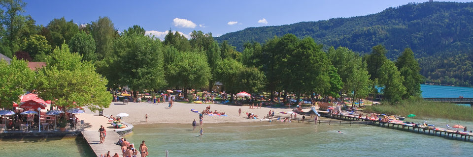 beach and lido at portschach lake worthersee