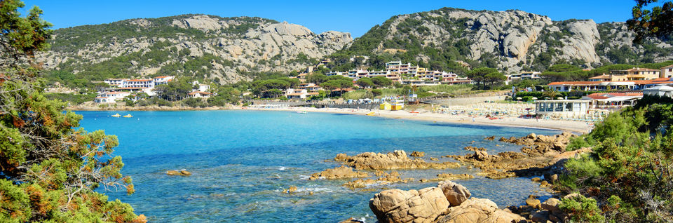 baia sardinia beach and town coastal view