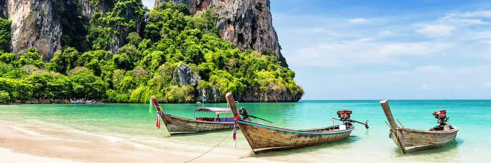 thailand island long boats on beach