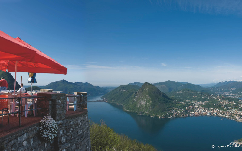 view of lake lugano from mountain restaurant