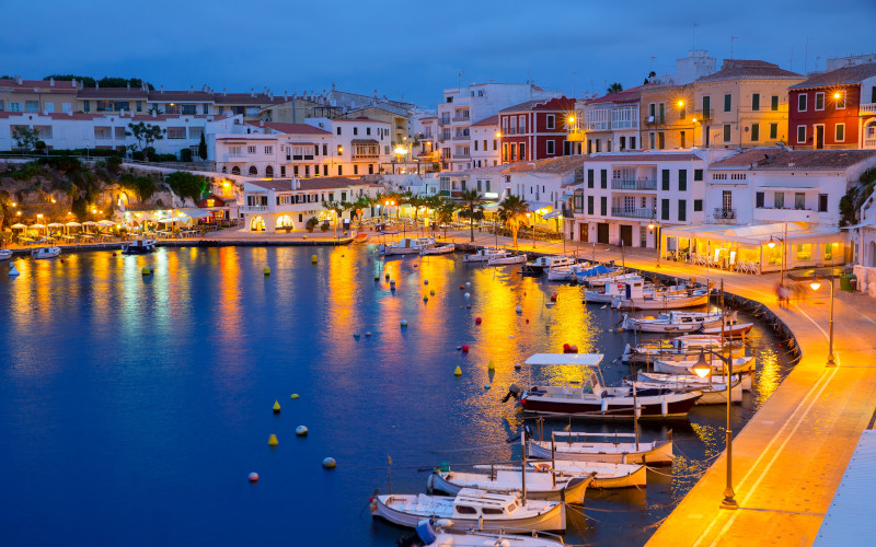 mahon marina at sunset in menorca